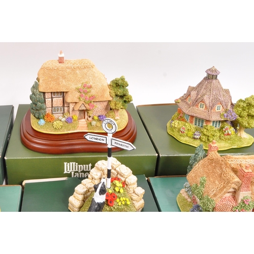 213 - Lilliput Lane - A collection of fourteen 20th Century Lilliput Lane cottage model figures all in ori... 