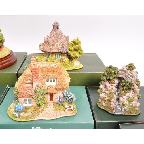 213 - Lilliput Lane - A collection of fourteen 20th Century Lilliput Lane cottage model figures all in ori... 