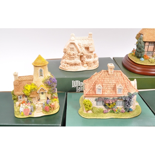 213 - Lilliput Lane - A collection of fourteen 20th Century Lilliput Lane cottage model figures all in ori... 