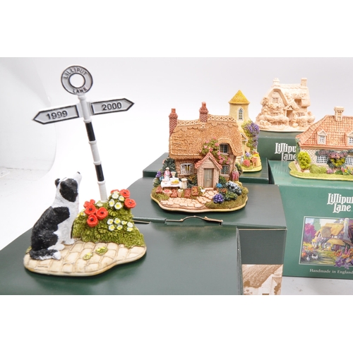 213 - Lilliput Lane - A collection of fourteen 20th Century Lilliput Lane cottage model figures all in ori... 