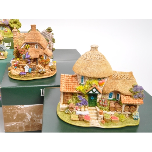 213 - Lilliput Lane - A collection of fourteen 20th Century Lilliput Lane cottage model figures all in ori... 