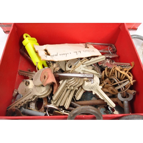 214 - A large collection of 20th century keys and locks. The collection including examples from Squire, Er... 