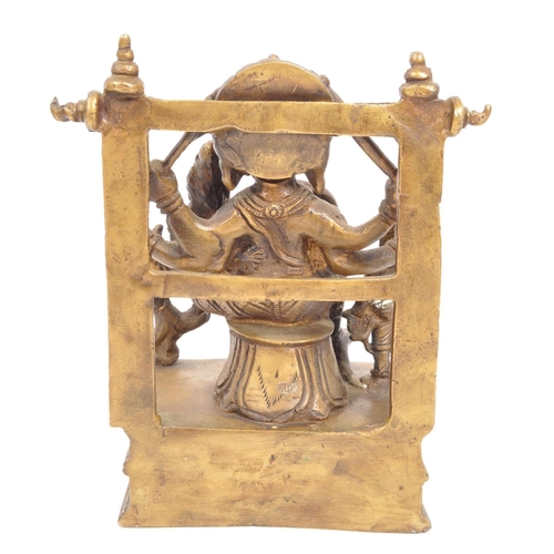 215 - A large brass Indian Hindu figure statue of the Lord Ganesha sat upon square raised base with the go... 