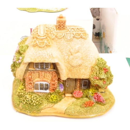 217 - Lilliput Lane - A collection of fifteen Lilliput Lane cottage model figures all in original boxes, s... 