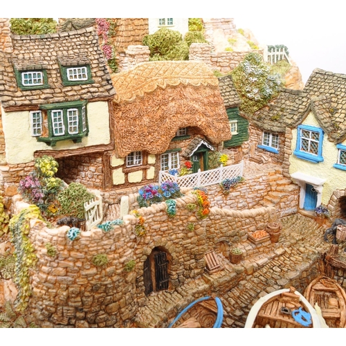 221 - Lilliput Lane - A large 20th Century Lilliput Lane cottages model figure ' Out of the Storm ' L2064,... 