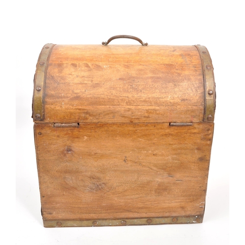 227 - A 19th century oak wood domed top bottle casket box. The casket having a hinged lid to top, with met... 