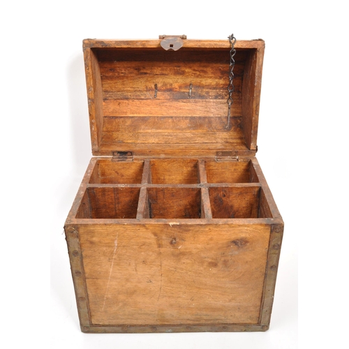 227 - A 19th century oak wood domed top bottle casket box. The casket having a hinged lid to top, with met... 