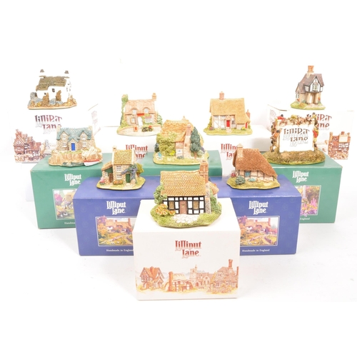 234 - Lilliput Lane - A collection of ten small Lilliput Lane cottage model figures all in original boxes,... 