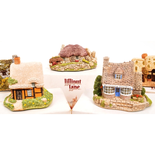 235 - Lilliput Lane - A collection of eleven small Lilliput Lane cottage model figures all in original box... 