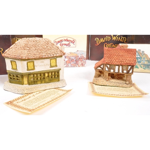 239 - David Winter - A collection of David Winter cottages model figures comprising of eight in original b... 