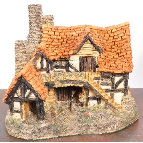 239 - David Winter - A collection of David Winter cottages model figures comprising of eight in original b... 