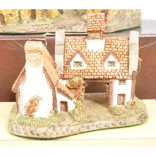 239 - David Winter - A collection of David Winter cottages model figures comprising of eight in original b... 