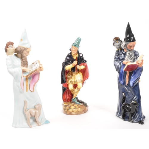 24 - Royal Doulton - A collection of three porcelain china Royal Doulton figurines. Comprising of The Wiz... 