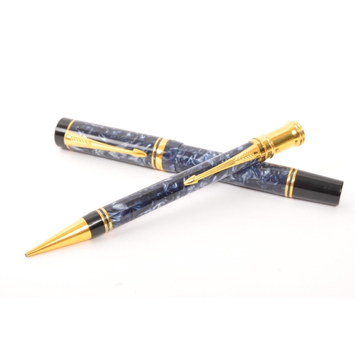 242 - Parker - A matching Parker DuoFold Centennial fountain pen and propelling pencil. Having marbled blu... 