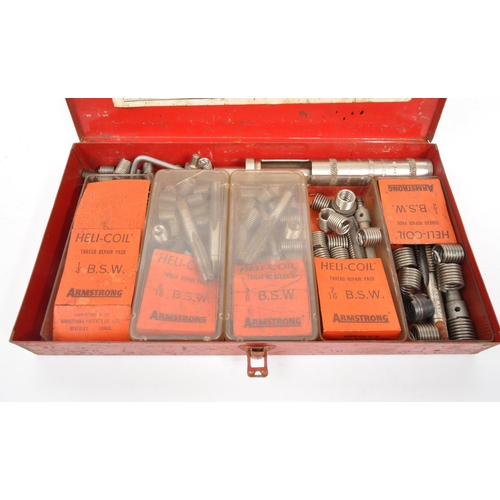 243 - A mid 20th century table lathe and Armstrong thread repair kit. The kit in original tin, with a larg... 