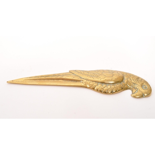 248 - A 20th Century vintage brass letter opener in the form of a parrot. Measuring approximately 19cm x 5... 