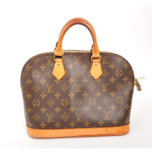 249 - Louis Vuitton - A monogram Alma Louis Vuitton handbag. Having monogram coated canvas exterior with b... 