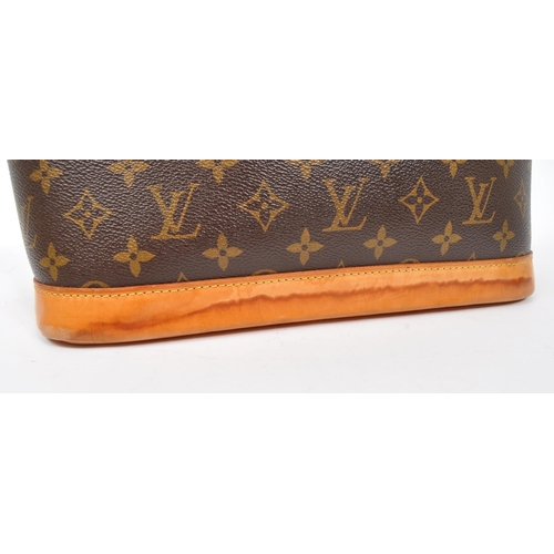 249 - Louis Vuitton - A monogram Alma Louis Vuitton handbag. Having monogram coated canvas exterior with b... 