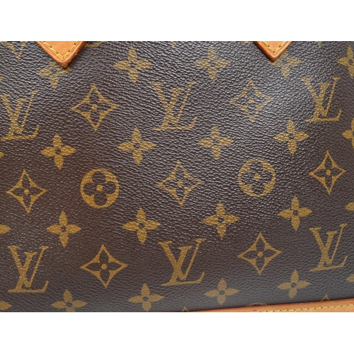 249 - Louis Vuitton - A monogram Alma Louis Vuitton handbag. Having monogram coated canvas exterior with b... 