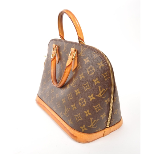 249 - Louis Vuitton - A monogram Alma Louis Vuitton handbag. Having monogram coated canvas exterior with b... 