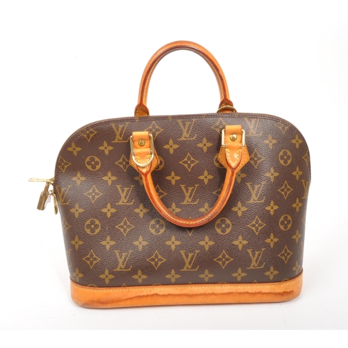 249 - Louis Vuitton - A monogram Alma Louis Vuitton handbag. Having monogram coated canvas exterior with b... 