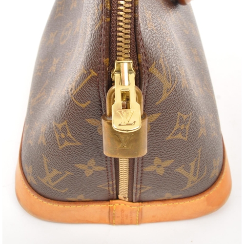 249 - Louis Vuitton - A monogram Alma Louis Vuitton handbag. Having monogram coated canvas exterior with b... 