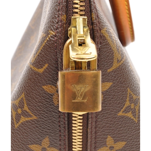 249 - Louis Vuitton - A monogram Alma Louis Vuitton handbag. Having monogram coated canvas exterior with b... 