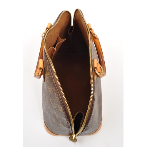 249 - Louis Vuitton - A monogram Alma Louis Vuitton handbag. Having monogram coated canvas exterior with b... 