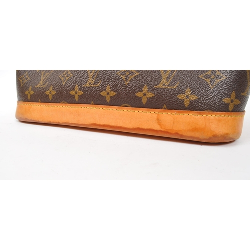 249 - Louis Vuitton - A monogram Alma Louis Vuitton handbag. Having monogram coated canvas exterior with b... 