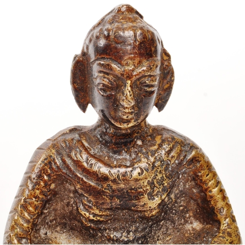 256 - A small 19th Century hollow bronze Chinese Buddha figure in lotus position with arms meeting at fron... 