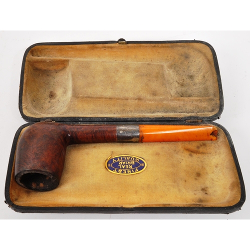 258 - A collection of 20th Century vintage smoking pipes to include two in cases and a wooden pipe holder.... 