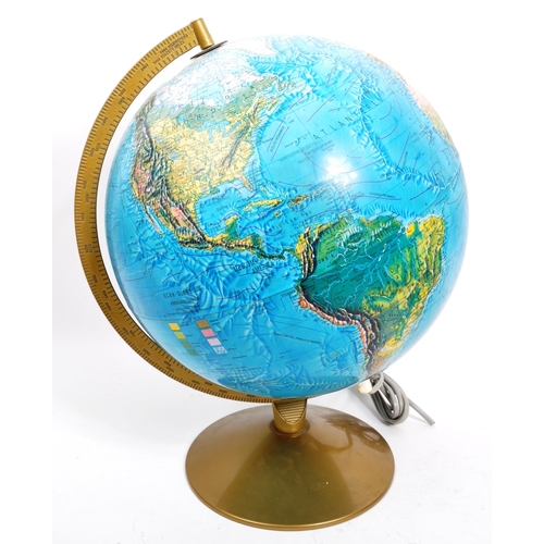 259 - Two 20th Century desktop globes the larger raised on circular base with light. The smaller within a ... 