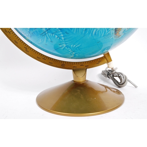 259 - Two 20th Century desktop globes the larger raised on circular base with light. The smaller within a ... 