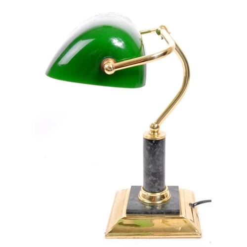 261 - A 20th Century vintage green bankers table top desk lamp light. With a green glass lightshade upon a... 