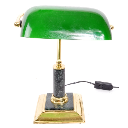 261 - A 20th Century vintage green bankers table top desk lamp light. With a green glass lightshade upon a... 