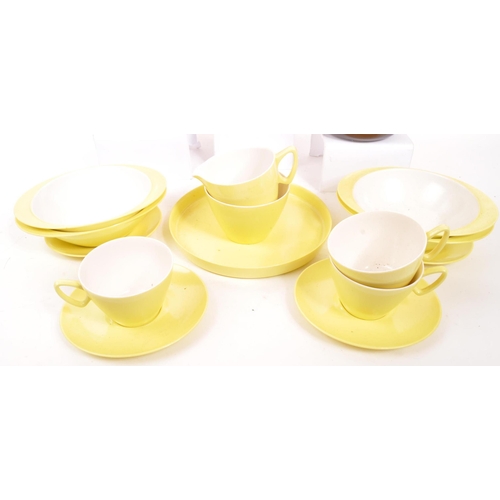 266 - Gaydon Melmex - A mid Century vintage yellow and white two tone part tea service comprising of 4x te... 