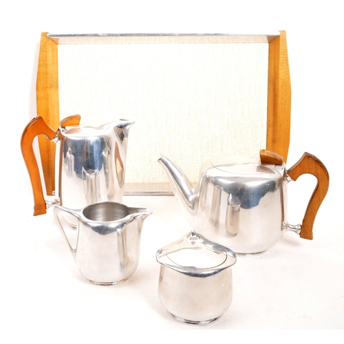 268 - Picquot Ware - A mid Century vintage Picquot Ware five piece tea / coffee set comprising of coffee p... 