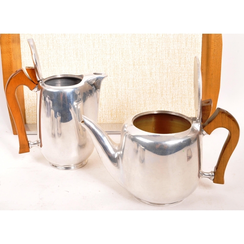 268 - Picquot Ware - A mid Century vintage Picquot Ware five piece tea / coffee set comprising of coffee p... 