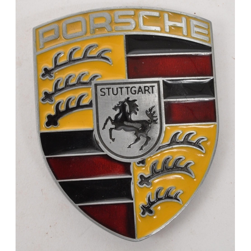 270 - A collection of 20th century Porsche Motors memorabilia items. The collection to include a Porsche b... 