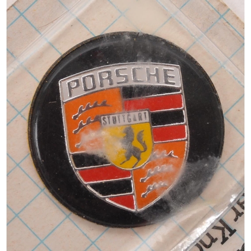 270 - A collection of 20th century Porsche Motors memorabilia items. The collection to include a Porsche b... 