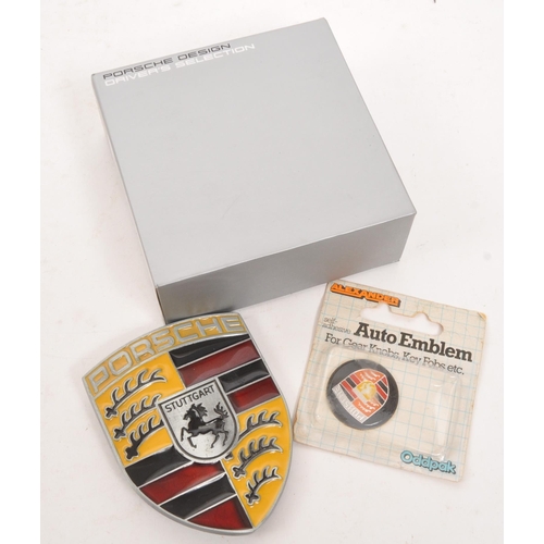 270 - A collection of 20th century Porsche Motors memorabilia items. The collection to include a Porsche b... 