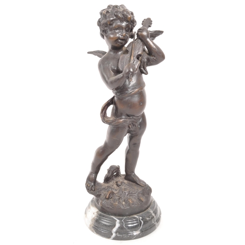 274 - A reproduction bronze figure in the form of a cherub / putti playing the violin, raised on a circula... 