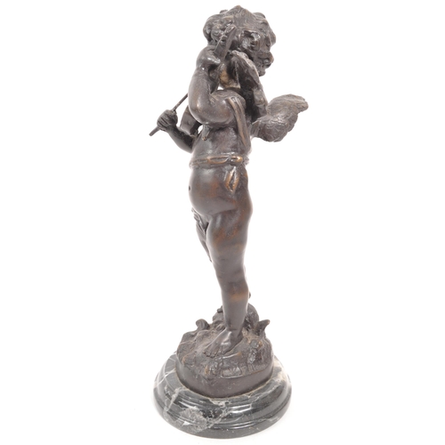 274 - A reproduction bronze figure in the form of a cherub / putti playing the violin, raised on a circula... 