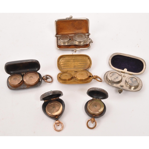 279 - A collection of early 20th century gold sovereign coin cases. Six in total, most of metal constructi... 