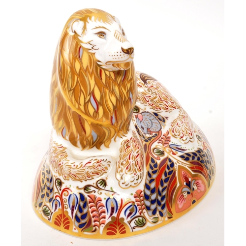 28 - Royal Crown Derby - A porcelain china Royal Crown Derby imari paperweight figure Lion modelled and d... 