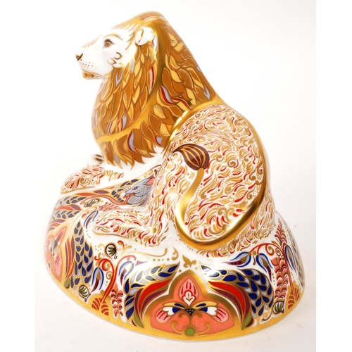 28 - Royal Crown Derby - A porcelain china Royal Crown Derby imari paperweight figure Lion modelled and d... 