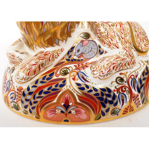 28 - Royal Crown Derby - A porcelain china Royal Crown Derby imari paperweight figure Lion modelled and d... 