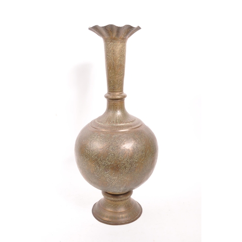 282 - A large 20th century brass Benares vase. The vase raised on a rounded base with bulbous body, and fl... 