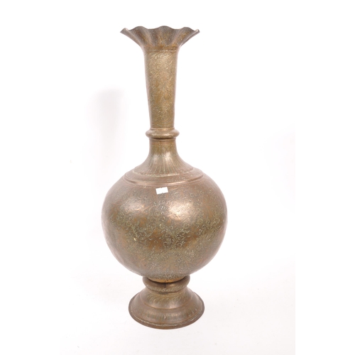 282 - A large 20th century brass Benares vase. The vase raised on a rounded base with bulbous body, and fl... 