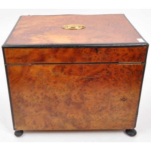 283 - An early 20th Century mahogany bell tantalus drinks box with four decanter lift out fitted interior.... 